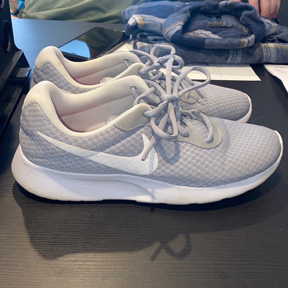 Women’s grey Nike sneakers